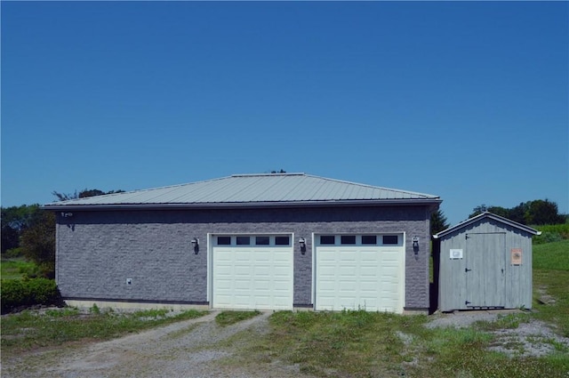 405 Hogg Rd, Worthington, PA 16262 - garage with a storage unit and dirt driveway