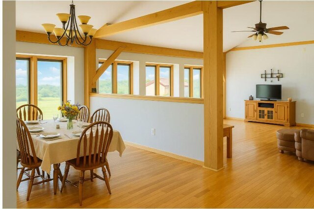 405 Hogg Rd, Worthington, PA 16262 - dining room with wood finished floors, a chandelier, and a ceiling fan
