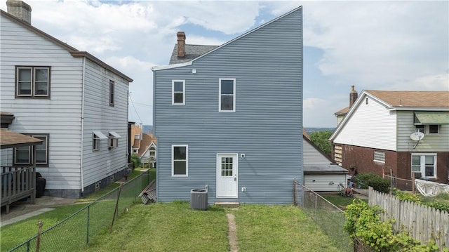 1914 Arlington Ave, Arlington, PA 15210 - back of house with a fenced backyard and a chimney