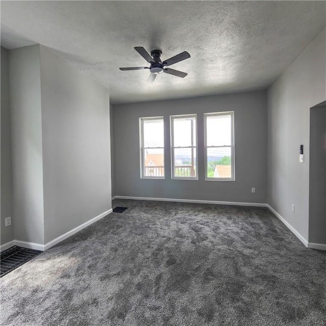1914 Arlington Ave, Arlington, PA 15210 - spare room with dark colored carpet, ceiling fan, and a textured ceiling