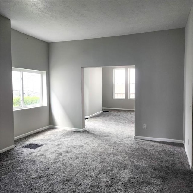 1914 Arlington Ave, Arlington, PA 15210 - carpeted empty room featuring a textured ceiling and baseboards