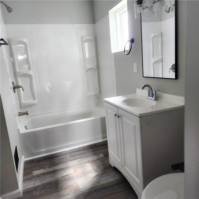 1914 Arlington Ave, Arlington, PA 15210 - bathroom featuring shower / bathtub combination, vanity, and wood finished floors