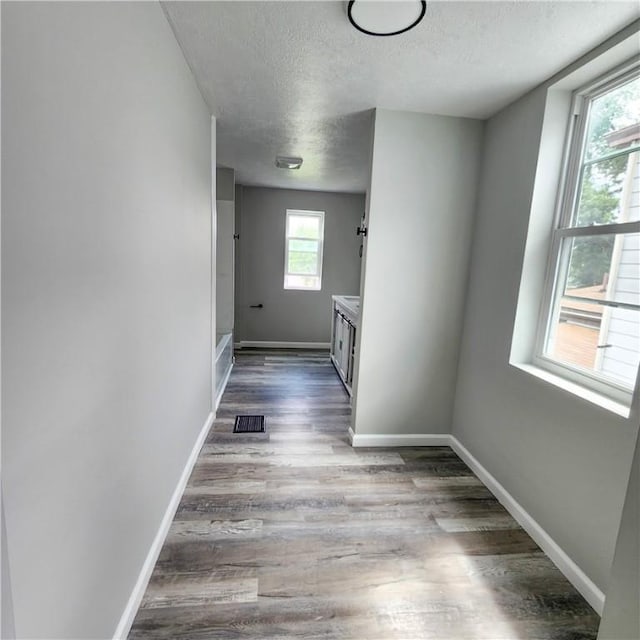 1914 Arlington Ave, Arlington, PA 15210 - hall with a textured ceiling and wood finished floors