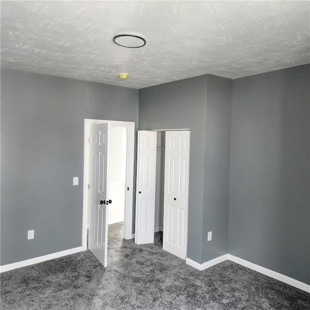 1914 Arlington Ave, Arlington, PA 15210 - unfurnished bedroom with carpet flooring, a textured ceiling, and a closet