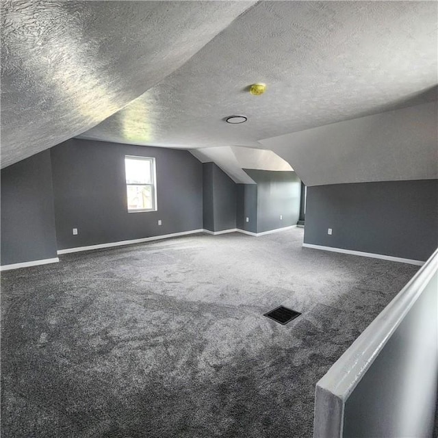 1914 Arlington Ave, Arlington, PA 15210 - bonus room featuring a textured ceiling, lofted ceiling, and carpet