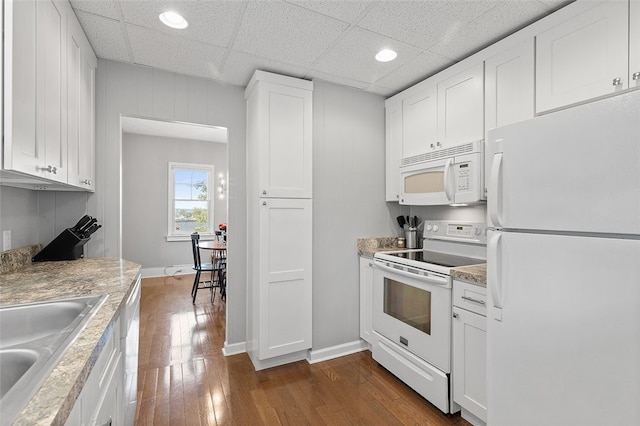 447 Highfield, Canonsburg, PA 15317 - kitchen featuring white appliances, dark wood-style floors, white cabinets, recessed lighting, and a paneled ceiling