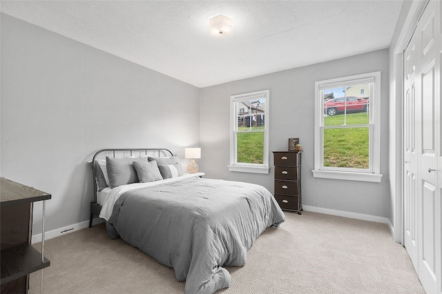 447 Highfield, Canonsburg, PA 15317 - carpeted bedroom with a closet and a textured ceiling
