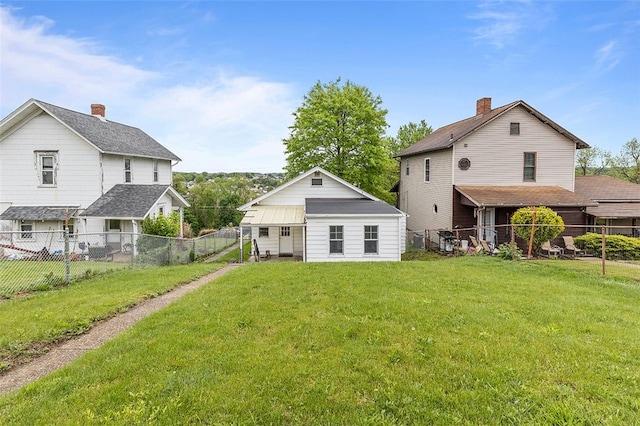 447 Highfield, Canonsburg, PA 15317 - back of house featuring a chimney and a fenced backyard