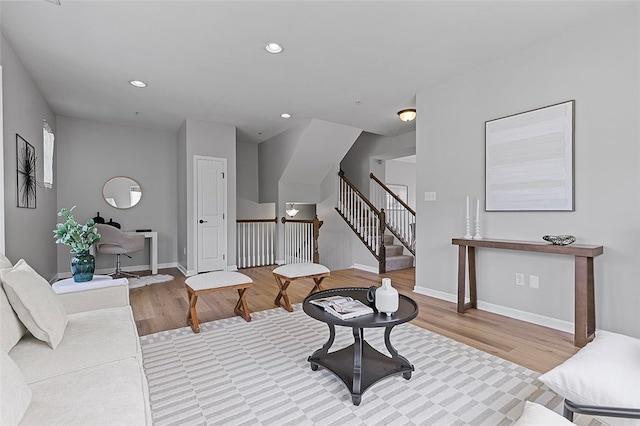 1009 Grey Fox Cir, Bridgeville, PA 15017 - living room featuring wood finished floors, recessed lighting, and stairway