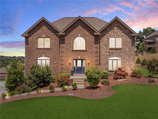 507 Saddlewood Dr, Peters Twp, PA 15367 - view of front of house featuring a yard, brick siding, and stone siding