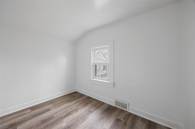 1 Core, City Of Washington, PA 15301 - spare room with vaulted ceiling and wood finished floors