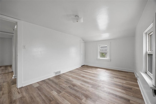 1 Core, City Of Washington, PA 15301 - empty room featuring wood finished floors and vaulted ceiling