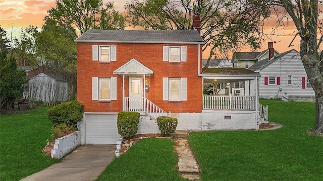 1 Core, City Of Washington, PA 15301 - colonial home with brick siding, driveway, an attached garage, and a front yard