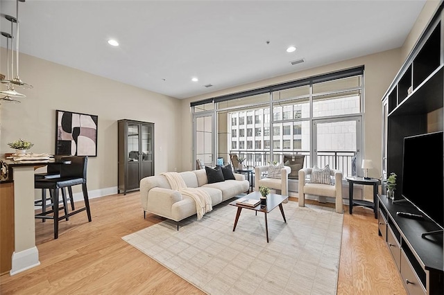 301 5th Unit 505, Downtown Pgh, PA 15222 - living area with light wood-style floors and recessed lighting