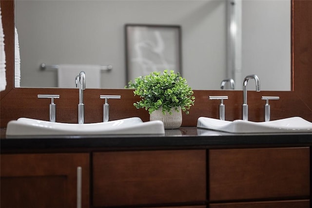 301 5th Unit 505, Downtown Pgh, PA 15222 - full bathroom featuring double vanity and tasteful backsplash
