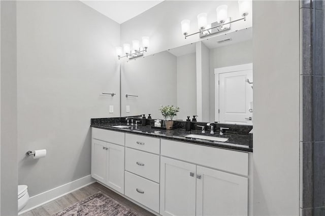 349 Azalea, Peters Twp, PA 15367 - bathroom with wood finished floors and double vanity