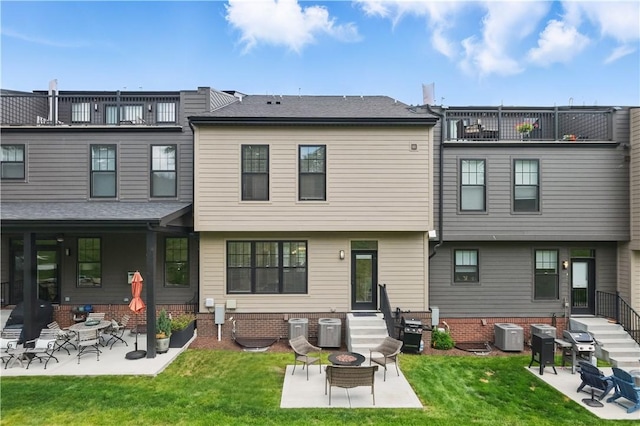 349 Azalea, Peters Twp, PA 15367 - back of house featuring a patio area, an outdoor fire pit, entry steps, and a balcony