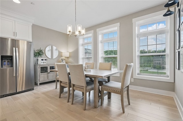 349 Azalea, Peters Twp, PA 15367 - dining space with light wood-type flooring and a chandelier