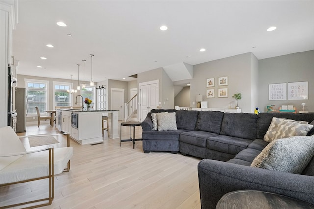 349 Azalea, Peters Twp, PA 15367 - living room with light wood-style floors, recessed lighting, and stairs