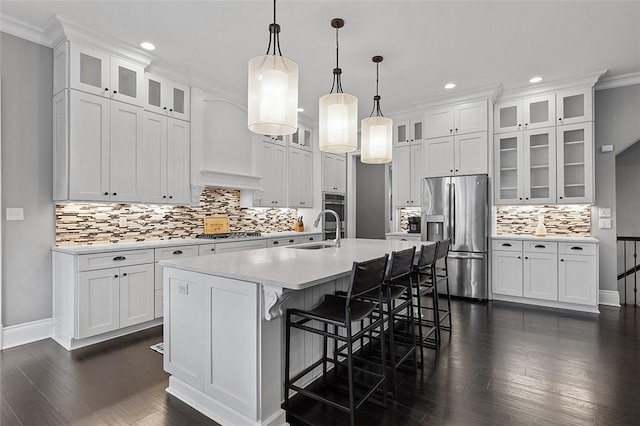 197 Wellington, Peters Twp, PA 15317 - kitchen with stainless steel appliances, recessed lighting, backsplash, dark wood finished floors, and light countertops