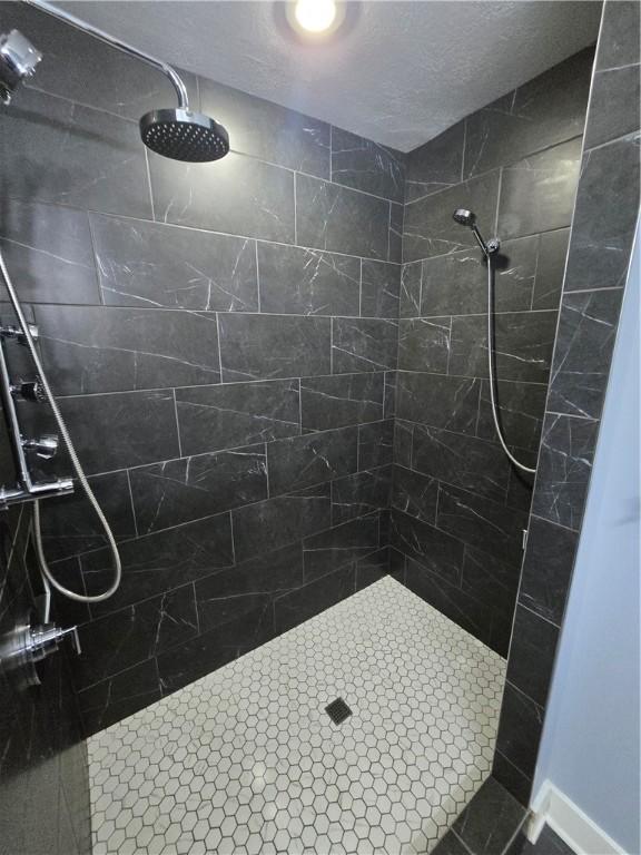 5303 Wickliff St, Lawrenceville, PA 15201 - bathroom with a tile shower