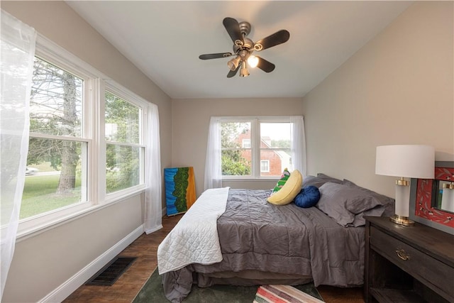 3715 Tuscarawas Rd, Brighton Twp, PA 15009 - bedroom with multiple windows, dark wood-style flooring, and a ceiling fan