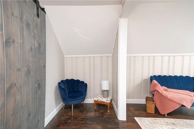 3715 Tuscarawas Rd, Brighton Twp, PA 15009 - sitting room with wood finished floors, a barn door, and lofted ceiling