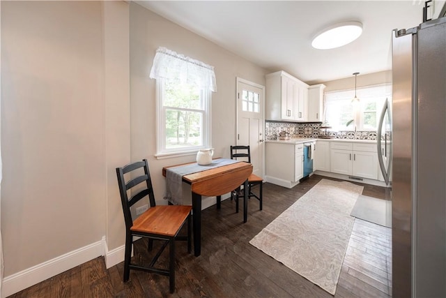 3715 Tuscarawas Rd, Brighton Twp, PA 15009 - kitchen with freestanding refrigerator, dishwashing machine, dark wood-style floors, white cabinetry, and light countertops