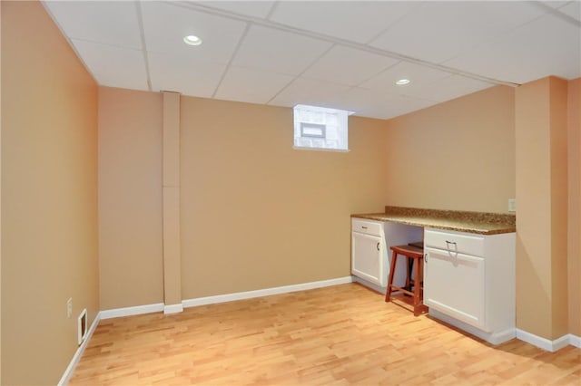 329 Oak Grove Ct, Mccandless, PA 15090 - unfurnished office with light wood-style flooring, recessed lighting, a drop ceiling, and built in desk