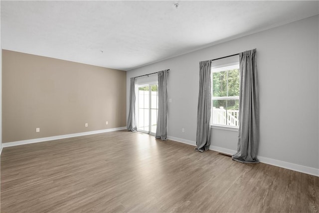 152 Cole Dr, Robinson Twp, PA 15136 - empty room with wood finished floors and baseboards