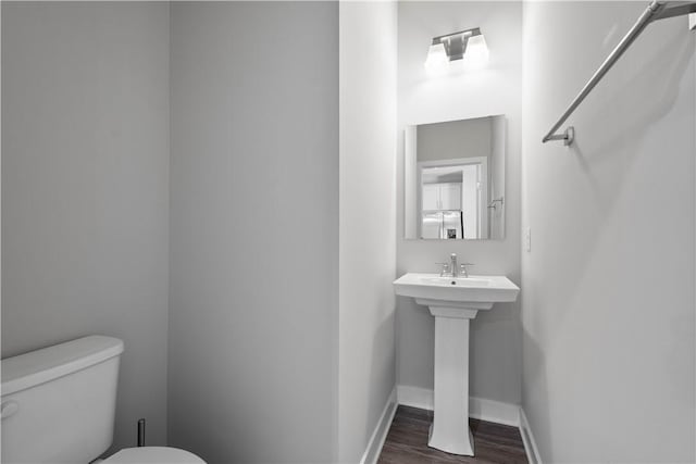 152 Cole Dr, Robinson Twp, PA 15136 - bathroom with toilet and wood finished floors