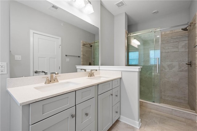 152 Cole Dr, Robinson Twp, PA 15136 - bathroom with a shower stall, double vanity, and tile patterned flooring