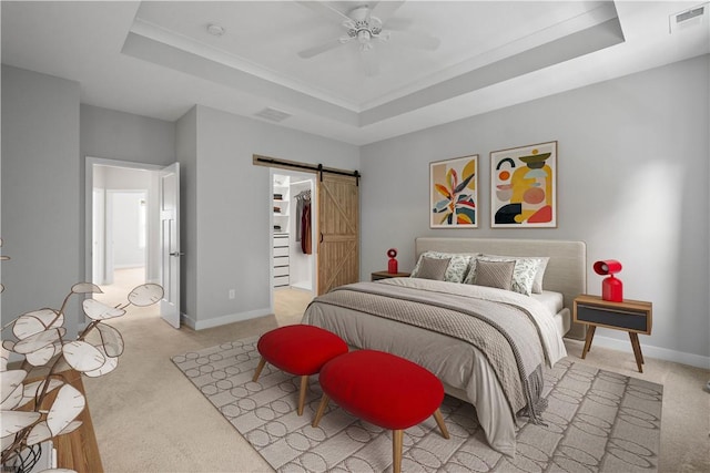 152 Cole Dr, Robinson Twp, PA 15136 - bedroom with light colored carpet, a raised ceiling, a barn door, and ceiling fan
