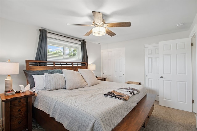 68 Cynthia Dr, Carnegie, PA 15106 - carpeted bedroom with two closets and a ceiling fan