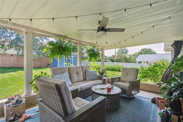 68 Cynthia Dr, Carnegie, PA 15106 - fenced backyard featuring a ceiling fan, an outdoor hangout area, and a patio