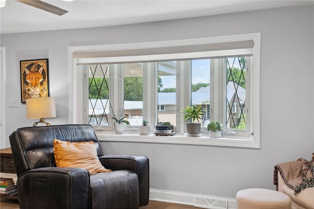 68 Cynthia Dr, Carnegie, PA 15106 - living area featuring wood finished floors, plenty of natural light, and ceiling fan
