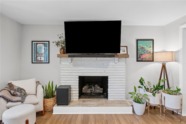 68 Cynthia Dr, Carnegie, PA 15106 - living area with wood finished floors and a fireplace with raised hearth
