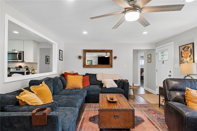 68 Cynthia Dr, Carnegie, PA 15106 - living area featuring wood finished floors, ceiling fan, and recessed lighting