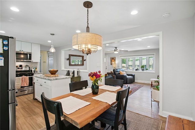 68 Cynthia Dr, Carnegie, PA 15106 - dining space featuring recessed lighting, ceiling fan, light wood-style floors, and a chandelier