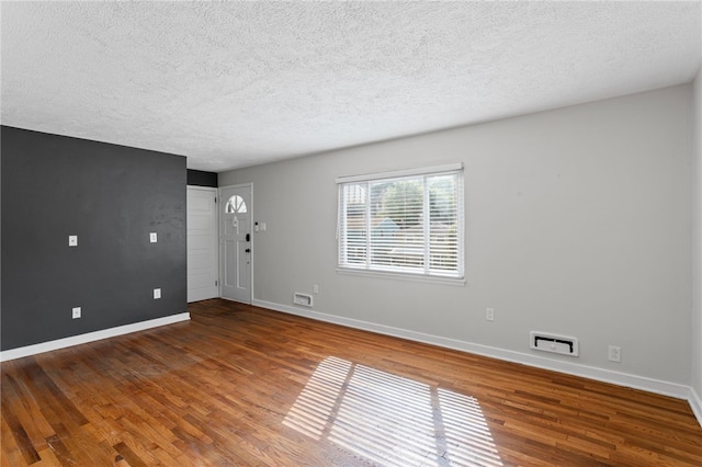 334 Shaler St, Mt Washington, PA 15211 - empty room with a textured ceiling and wood finished floors