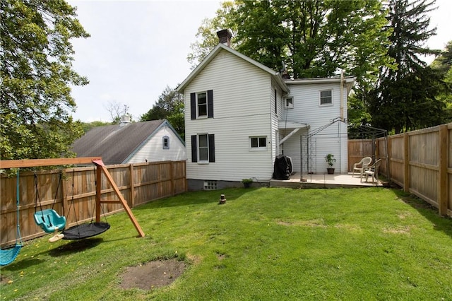 901 Alexander St, Shaler, PA 15116 - back of house featuring a patio, a fenced backyard, and a chimney