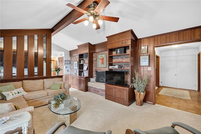566 Ridgeview Rd, East Huntingdon, PA 15666 - living room with wooden walls, ceiling fan, and light carpet