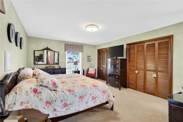 566 Ridgeview Rd, East Huntingdon, PA 15666 - bedroom featuring light colored carpet and two closets