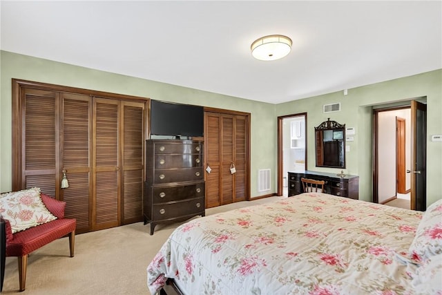 566 Ridgeview Rd, East Huntingdon, PA 15666 - bedroom featuring two closets and light colored carpet