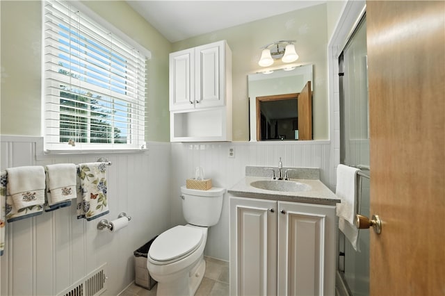 566 Ridgeview Rd, East Huntingdon, PA 15666 - bathroom featuring a wainscoted wall, vanity, and tile patterned floors