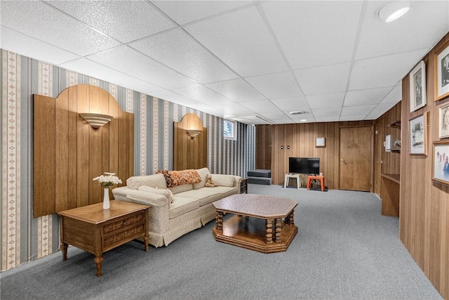 566 Ridgeview Rd, East Huntingdon, PA 15666 - living area featuring wallpapered walls, carpet flooring, a paneled ceiling, and wooden walls