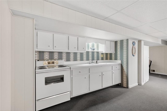 566 Ridgeview Rd, East Huntingdon, PA 15666 - kitchen featuring white electric range oven, wallpapered walls, white cabinets, dark colored carpet, and light countertops