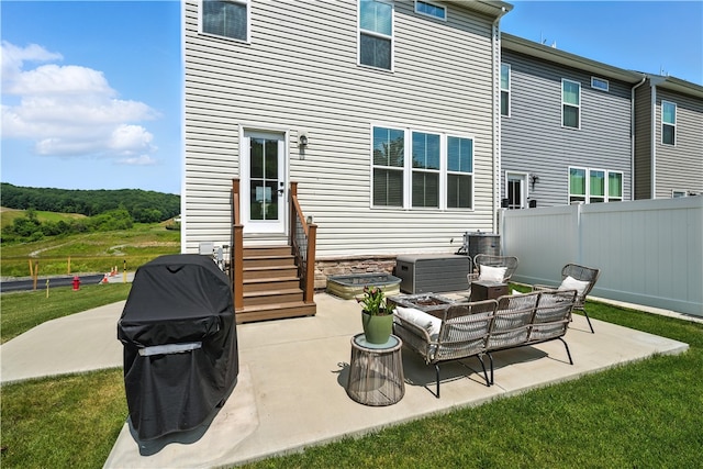 124 Rivulet Pl, Jackson Twp, PA 16063 - rear view of property with entry steps, a patio area, and an outdoor living space