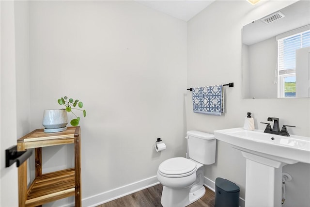 124 Rivulet Pl, Jackson Twp, PA 16063 - bathroom featuring baseboards and wood finished floors