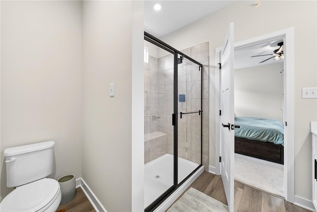 124 Rivulet Pl, Jackson Twp, PA 16063 - full bath featuring connected bathroom, wood finished floors, a shower stall, and a ceiling fan